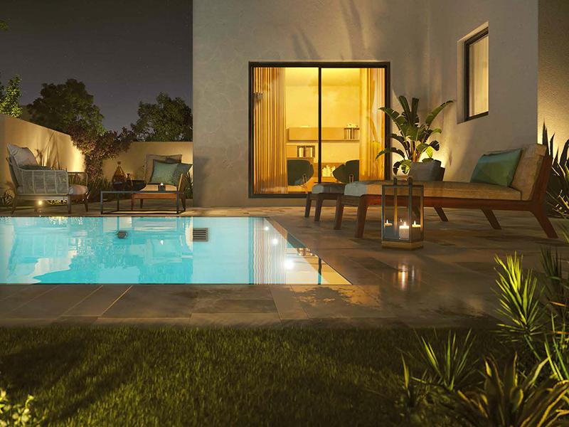 Yas Island Noya Viva Abu Dhabi sustainable family community with landscaped gardens, townhouses, and leisure facilities.